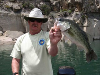 Mark Nesbit displays a Largemouth bass from Navajo Lake, New Mexico.