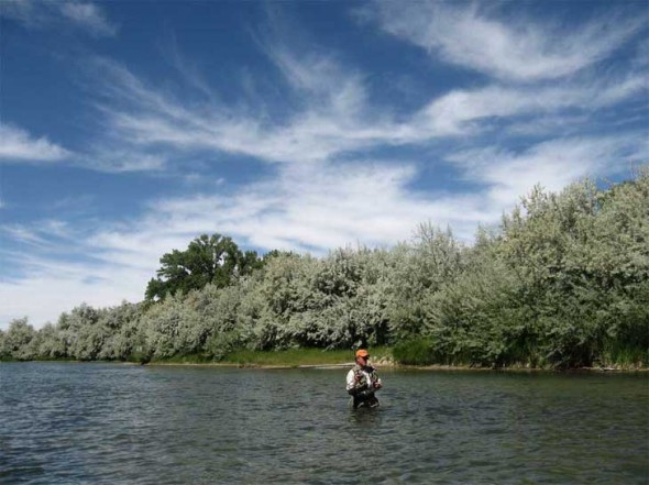 A lone angler enjoys the solitude of fishing the San Juan River at Soaring Eagle Lodge in New Mexico.
