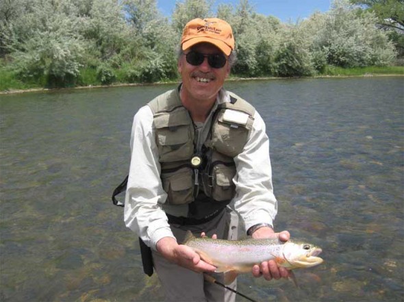 Thom Cole and a nice Rainbow trout he caught in the San Juan River at Soaring Eagle Lodge during a early summer outing in 2010.