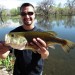 Leo Salcido of Albuquerque, shows of a nice, fat, bigmouth bass he caught at Shady Lakes.