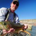 Mark Wethington, Fisheries Biologist for the New Mexico Department of Game and Fish (NMDGF) shows off a nice Rainbow trout caught in revitalized Braids section of the San Juan River.