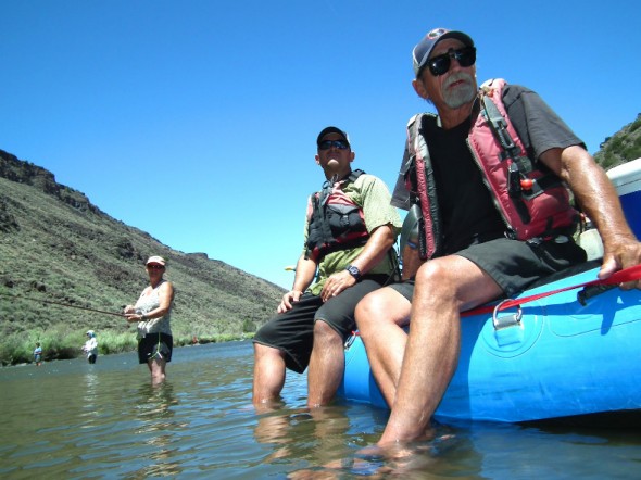 Far Flung Adventures Rafting Guide, Ricus Ginn, on the left, hang out with his boss, Steve Harris, during a Project Wild outing in June.