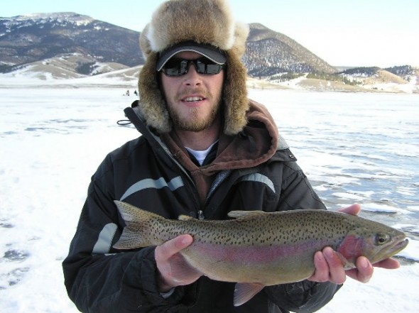 Matt Pelletier shows off a nice trout caught while ice fishing in New Mexico.