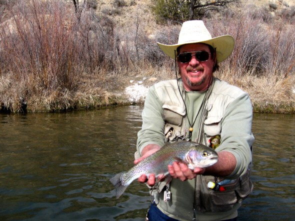 man holding trout